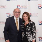 Honoree Ken Feinberg and Chair of the Board of Trustees Maria Rodriguez