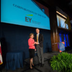 EY accepting the Corporation of the Year Award