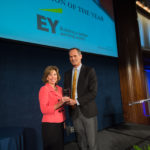 Patti Yoder accepting the Corporation of the Year award on behalf of EY